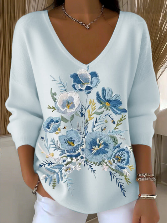 Niebieski kwiatowy haftowany damski sweter z dekoltem w szpic
