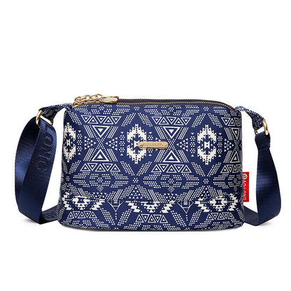 【Estetyczny i praktyczny】👜 Damska torba crossbody z wieloma kieszeniami i nadrukiem