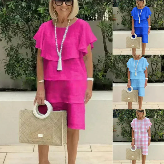 Szyfonowa sukienka z krótkim rękawem do kolan z falbankami