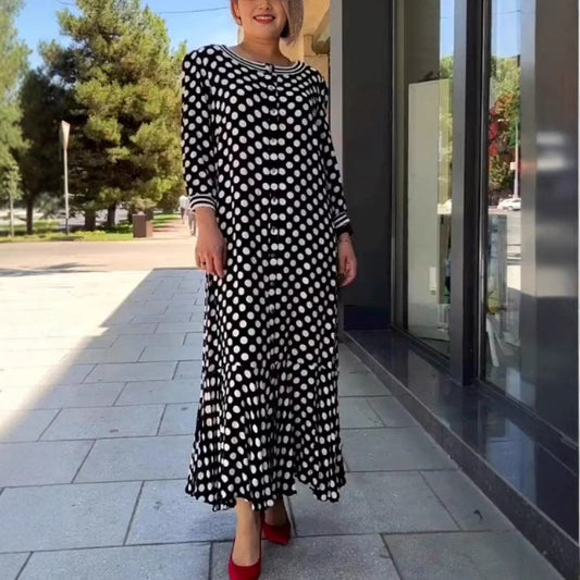 Damska elegancka sukienka w kropki z długim rękawem