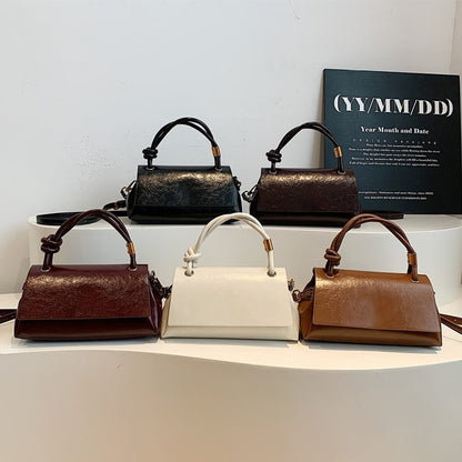 Damską torebkę crossbody z mini uchwytem