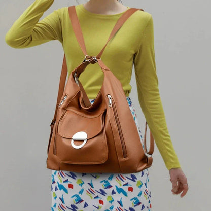 Damską modną skórzaną torebkę z wieloma kieszeniami