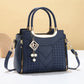 👜50% ΕΚΠΤΩΣΗ! ✨ Γυναικεία τσάντα τύπου satchel με ραφές σε σχήμα V – Χρυσά μεταλλικά στοιχεία, πολλαπλά διαμερίσματα, χερούλι στην κορυφή 🌸