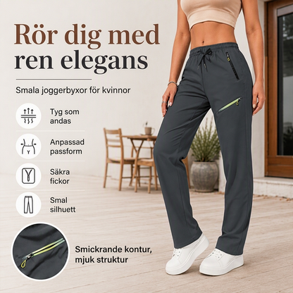 Raka sportbyxor för kvinnor med dragkedje-fickor